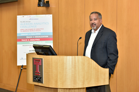 George Llado, keynote speaker, addresses the crowd.